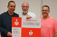 Spende Lions Club an Caritas-Aktion Schulmaterial